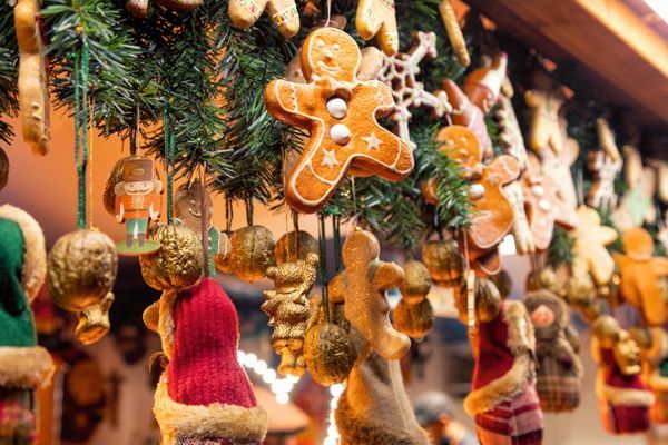 Traditional seasonal items gifts and Christmas decorations at Weihnachtsmarkt (Christmas market) stall in Central Berlin, Germany